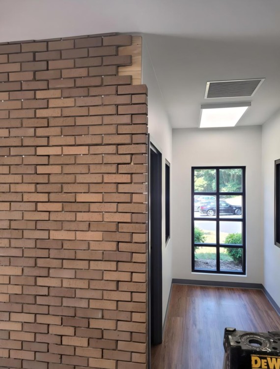 Interior views of brick wall in office building